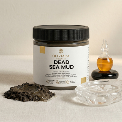 Dead Sea Mud jar with mud and oil bottle on a neutral background